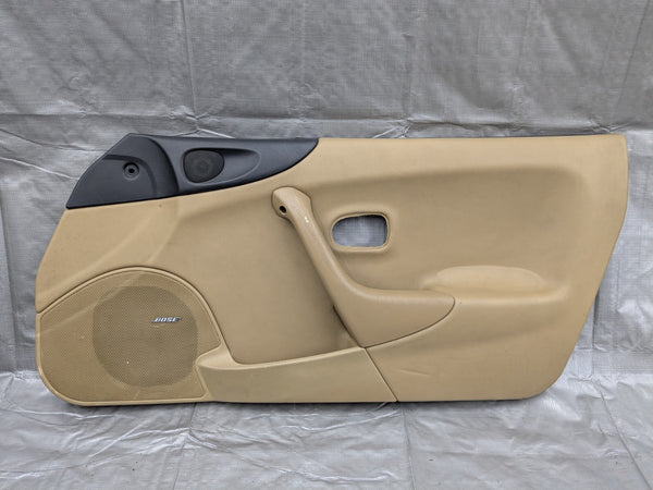 1999–2000 Mazda Miata MX-5 Passenger Door Panel Tan w/ Bose OEM NA75-58-590C — Mazda Miata MX-5 OEM part product photo