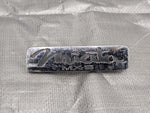 99-05 MAZDA MIATA MX5 MX-5 REAR EMBLEM LOGO BADGE SYMBOL 1999-2005 — Mazda Miata MX-5 OEM part product photo