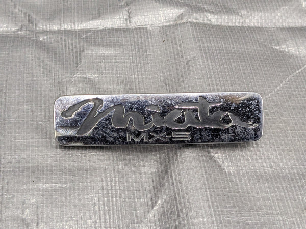 99-05 MAZDA MIATA MX5 MX-5 REAR EMBLEM LOGO BADGE SYMBOL 1999-2005 — Mazda Miata MX-5 OEM part product photo