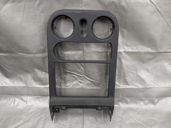 90-93 Mazda MX-5 Miata NA Tombstone Stereo Radio Surround HVAC Bezel Trim 90NAUC — Mazda Miata MX-5 OEM part product photo