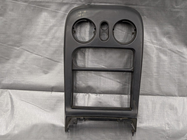 1994-1997 Mazda Miata MX-5 OEM Center Console Radio Trim Bezel Tombstone Black — Mazda Miata MX-5 OEM part product photo