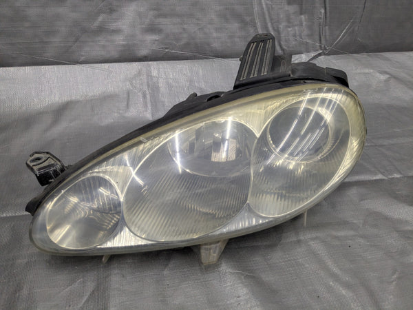 2001–2005 Mazda Miata MX-5 NB2 OEM Driver Headlight Assembly N067-51-0L0 01-05 — Mazda Miata MX-5 OEM part product photo