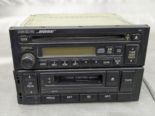 1999-2000 Mazda Miata MX-5 Bose Radio CD Cassette Player OEM NC10-66-9S0 99-00 — Mazda Miata MX-5 OEM part product photo