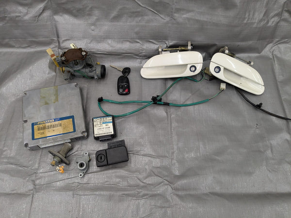 2001-2003 Mazda Miata Mx-5 OEM Ignition Key Set ECU PCM Manual BTT3-18-881 #2 01-03 — Mazda Miata MX-5 OEM part product photo