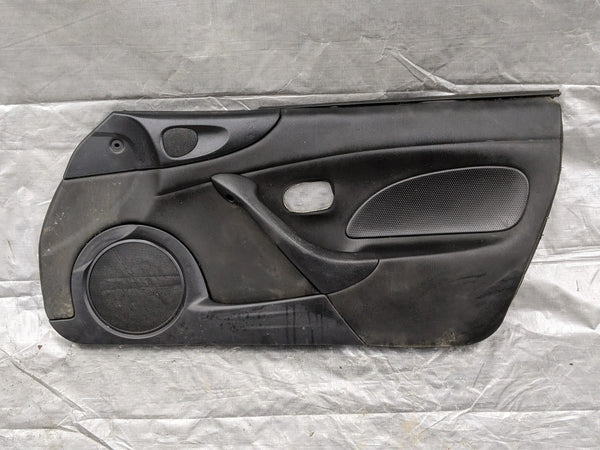 2001–2005 Mazda Miata MX-5 NB Passenger Door Panel Black OEM NC10-58-590 01-05 — Mazda Miata MX-5 OEM part product photo