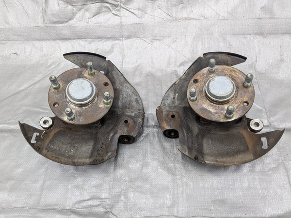 1990-1993 Mazda Miata Front  Spindle Hub Knuckle Pair Left & Right 90-93 90NAUC — Mazda Miata MX-5 OEM part product photo