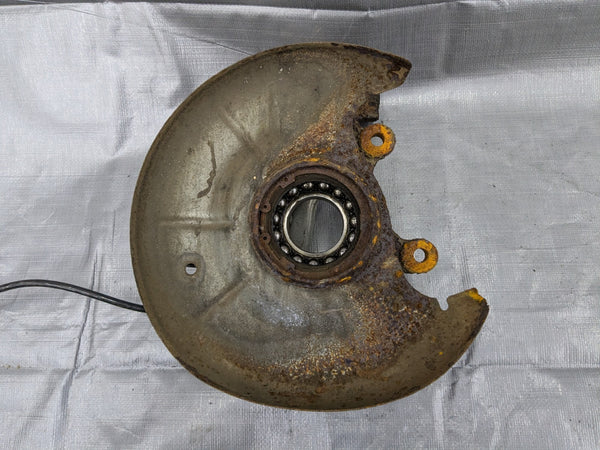90-93 Mazda Miata / Rear Spindle Knuckle / Passenger Side / ABS / RUSTY — Mazda Miata MX-5 OEM part product photo