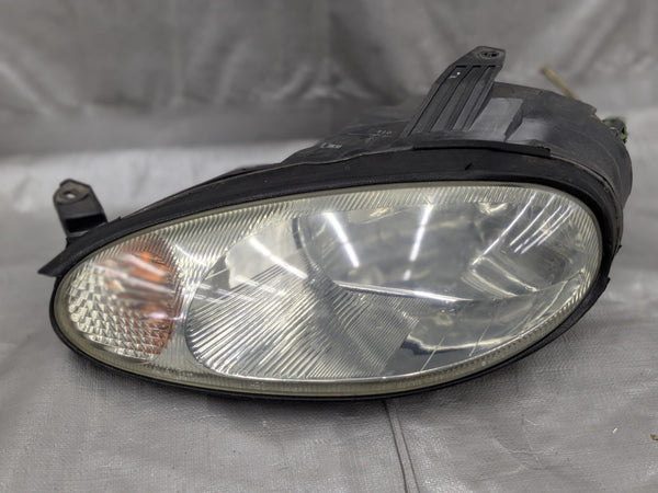 1999-2000 OEM Miata Headlight Assembly Driver Right Side NC10-51-041C 99-00 — Mazda Miata MX-5 OEM part product photo