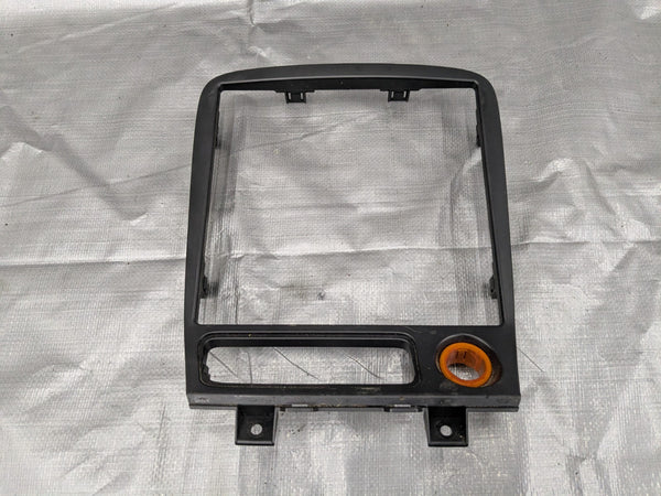 1999–2005 Mazda Miata MX-5 Radio Bezel Console Trim OEM NC10-55-210 99-05 — Mazda Miata MX-5 OEM part product photo