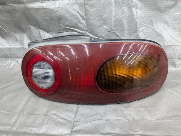 1990-1997 Mazda MX-5 Miata Passenger Right Rear Tail Light 90-97 90NAUC — Mazda Miata MX-5 OEM part product photo