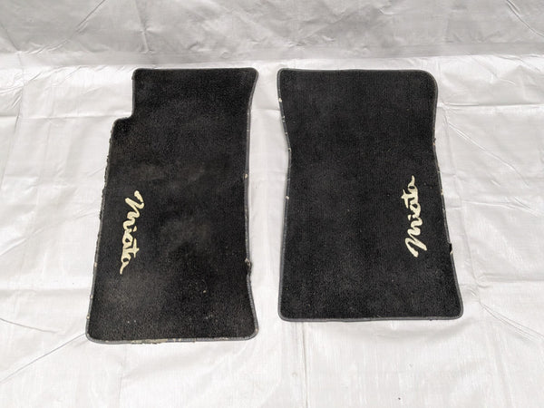 1990–1997 Mazda Miata MX-5 OEM Black Carpet Floor Mats Set NA01-68-760/761 90-97 — Mazda Miata MX-5 OEM part product photo