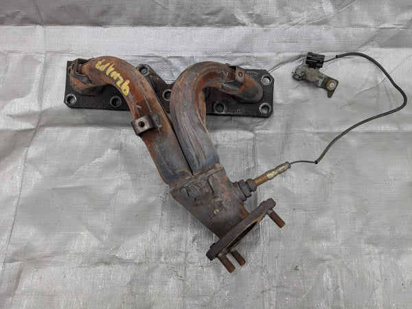 90-93  Mazda Miata mx-5 Exhaust Manifold Header Used Good Studs 92NAPZ — Mazda Miata MX-5 OEM part product photo