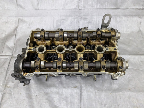90-93 Mazda MX-5 Miata OEM Engine CYLINDER HEAD 1.6L b61p-10-100a 90NAUC — Mazda Miata MX-5 OEM part product photo