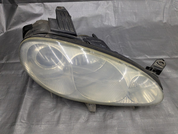 2001–2005 Mazda Miata MX-5 NB2 OEM Headlight Assembly N067-51-0K0 01-05 03NBA3D — Mazda Miata MX-5 OEM part product photo